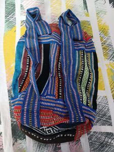 Embroidered bag pack lovely for travel and trendy. Totally unused.