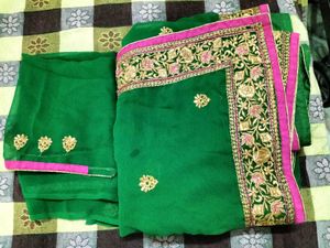 Elegant Green Saree with Pink Border