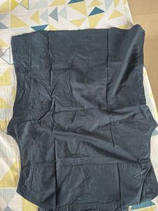 Black sleeveless button up top