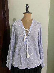 H&M Chic Lace-Up Blouse with Floral Embroidery