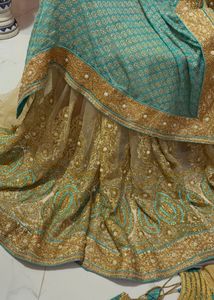 designer saree with worked blues