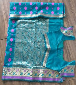 Elegant Teal Silk Saree with Pink Motifs