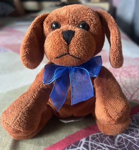Cute Brown Plush Dog Toy with Blue Bow