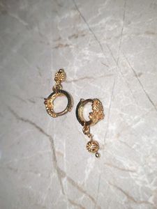 Gold Dangle Earrings with Intricate Design