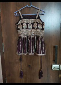 Embroidered Peplum Top