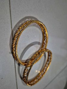 Exquisite Gold Bangles with Intricate Design