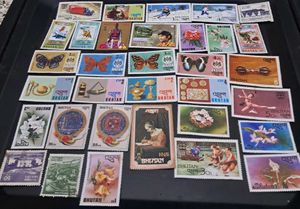 33 vintage Bhutan Stamps Collection