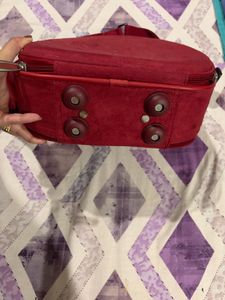 Red Summit Rolling mini luggage Bag