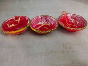 4 Decorative baskets for gifting or festive use.
