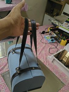 Stylish Blue Handbag with Brown Trim