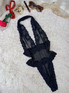 Lace Trimmed Black Bodysuit