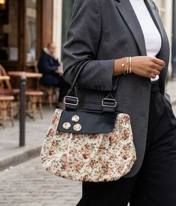 Chic Floral Handbag with Black Accents