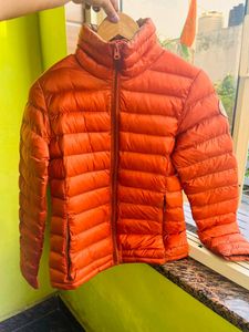 Orange puffer packable jacket