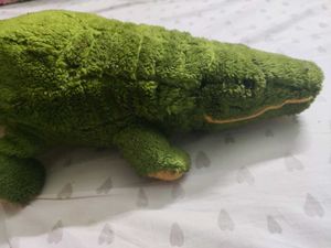 cozy alligator plushie