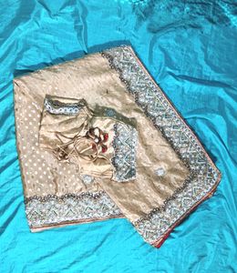 beautiful polka style golden heavy work saree