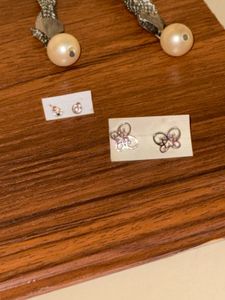 Pairs of 8 Earrings  (6 long, 2 small)