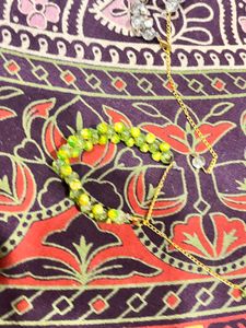 Green &amp; Yellow Beaded marble coloured Bracelet