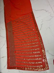Vibrant Orange Sequined Saree