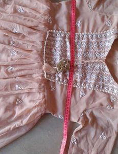 Elegant Peach Kurta with Intricate Embroidery