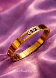 Sparkling Gold Bangle with moveable Diamonds