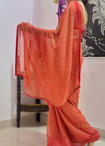 Beautiful Orange Printed Saree
