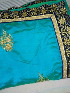 Elegant sea green Embroidered Saree