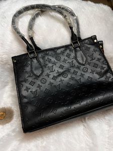 Embossed Black Handbag