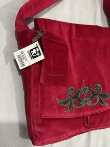 Velvet handbag with embroidery