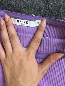 combo of  purple ribbed tube top and tights