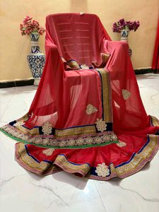 Elegant Red Embroidered pearl work Saree