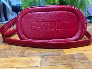 Red sling bag