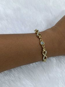 Sparkling Infinity Bracelet - Gold Tone