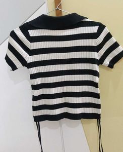 a black and white striped streetwear top. basic we