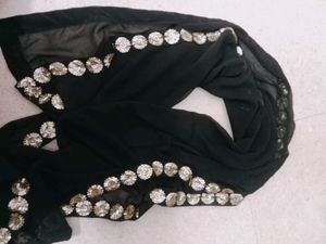 Elegant Black Saree with Gold Embellishments