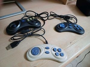 3 video game remote and 8 in 1 Cassettes