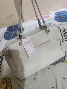 brand new White Handbag with Charm