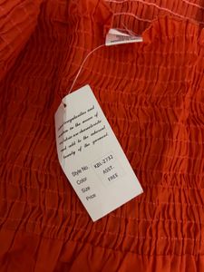 Orange Smocked Tiered Mini Dress