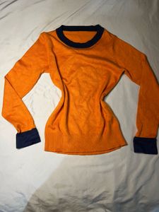 Orange Knit Sweater with Navy Accents