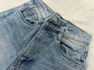 washed out distressed Blue baggy Jeans