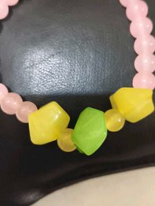 Chic Beaded Bracelet with Charms