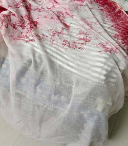 white and pink cotton batik print saree