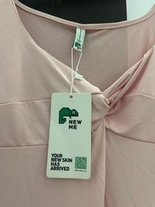 pastel Pink Twist Front newme mini dress