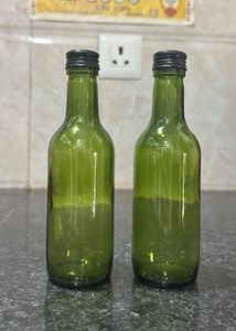 Set of 2 Green Glass Bottles