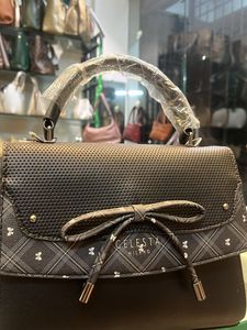 Chic Black Handbag with Bow Detail