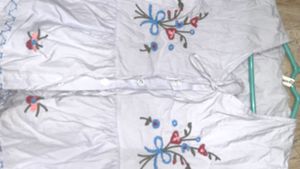 Embroidered light blue Peplum Top