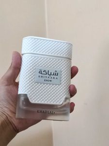 Empty bottle of Khadlaj Shiyaaka Snow Perfume