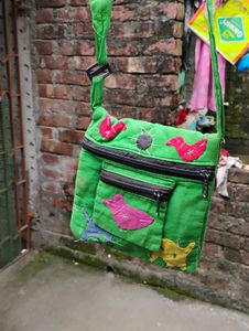 Vibrant Embroidered Sling Bag