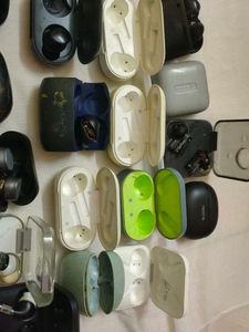 Assorted Earbud Cases and Earbuds