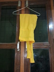 Yellow kurta with churidar and dupatta