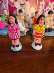 Clay dolls for jhulon decoration